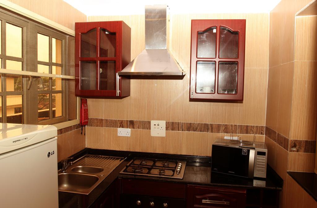 Apartment Royale Hotel & Suite Lagos Habitación foto